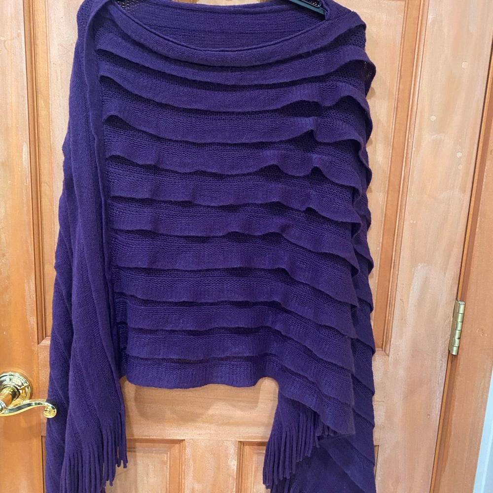 Purple shrug/poncho excellent condition. Vibrant purple very pretty
